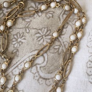 Gold and a White Bead Necklace. 34” Long.  Cute!